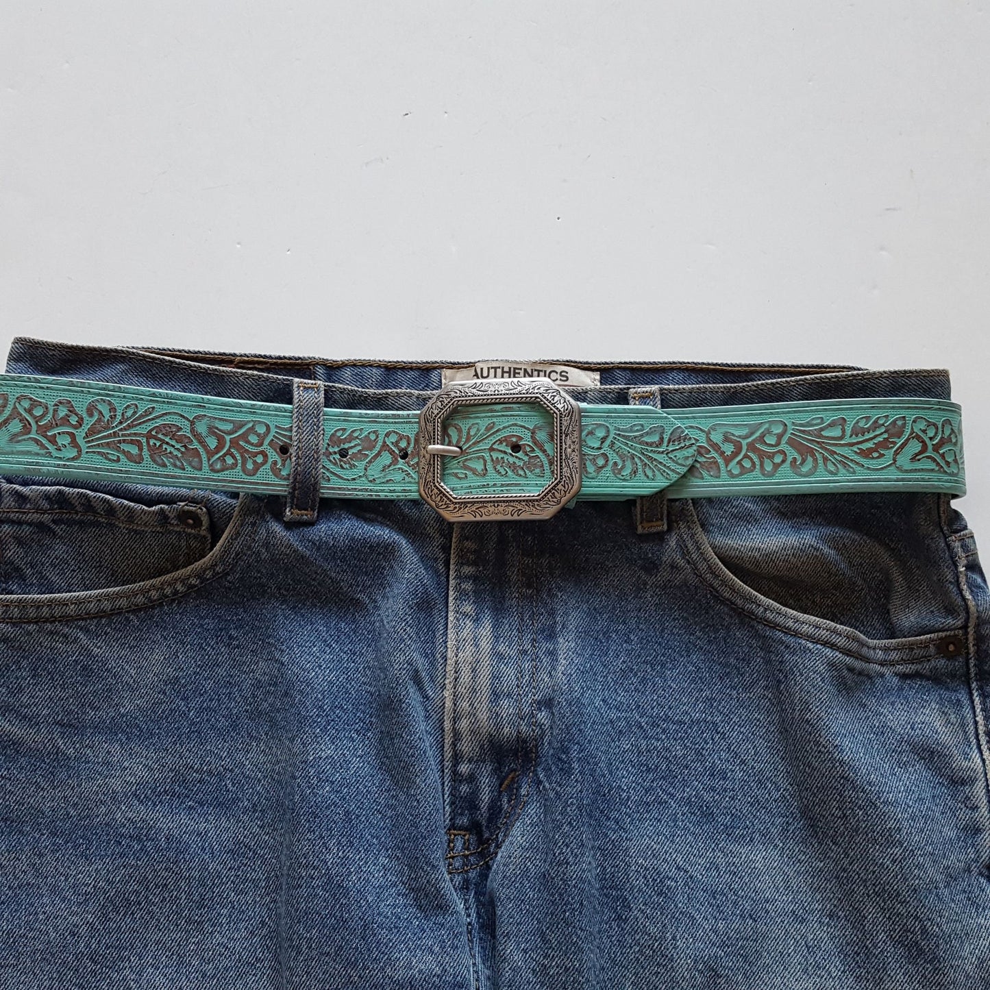 Belt: Trendy Floral Tooled Belt with a silver floral etched buckle