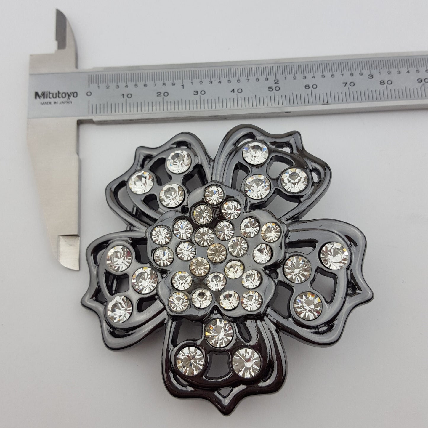 Buckle Sale: Flower belt buckle in gunmetal finish