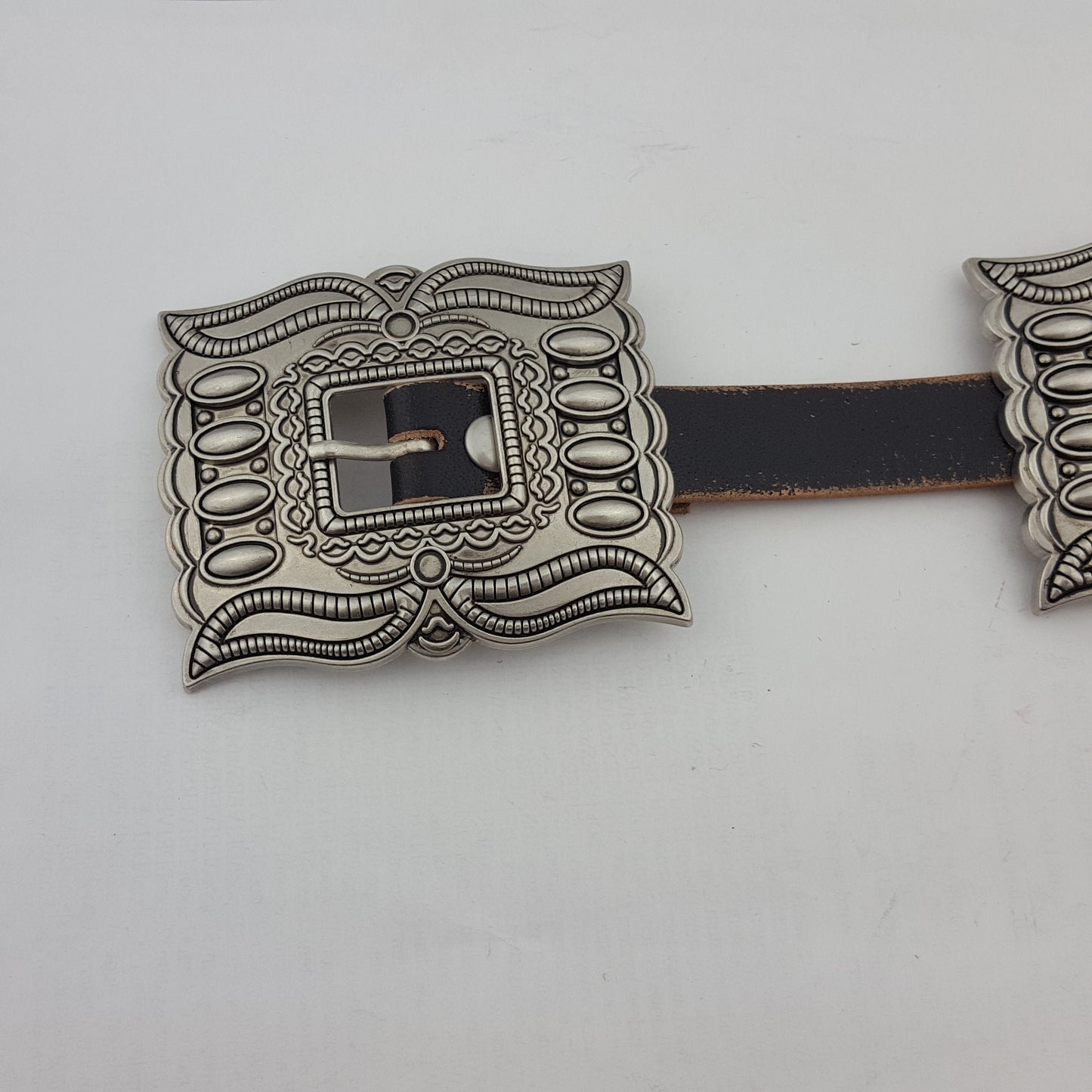 Belt: Western Genuine Distressed Leather belt with matching buckle and conchos
